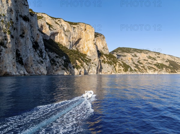 Motorboat rides on picturesque rocky coast ImmorgenLicht, cliffs, Golfo di Orosei, Baunei, Sardinia, Italy