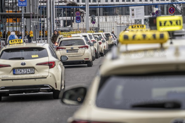 Taxis in front of the main train station in Berlin, waiting in line for passengers, Germany