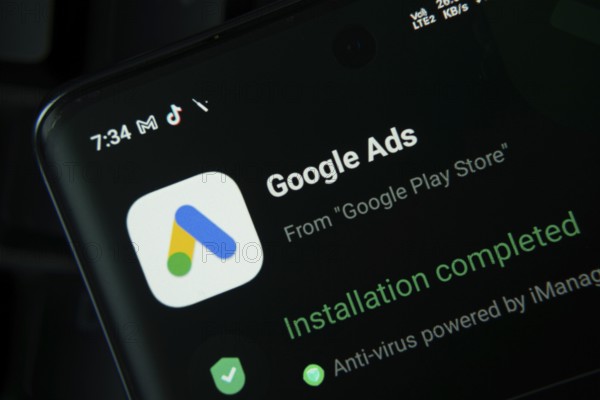 Dhaka, Bangladesh- 27 July 2025: Smartphone screen displaying Google Ads installation confirmation from the Play Store