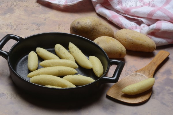 Raw Schupfnudeln in pan, type of pasta, Germany