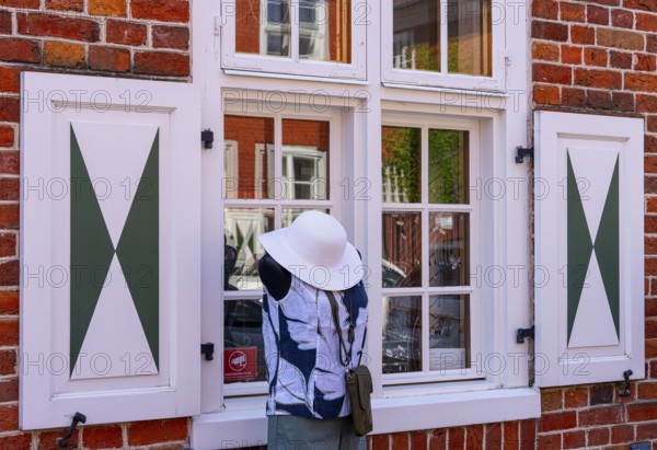 Catering, retail and typical, historic architecture in the Dutch Quarter in Potsdam, Brandenburg, Germany