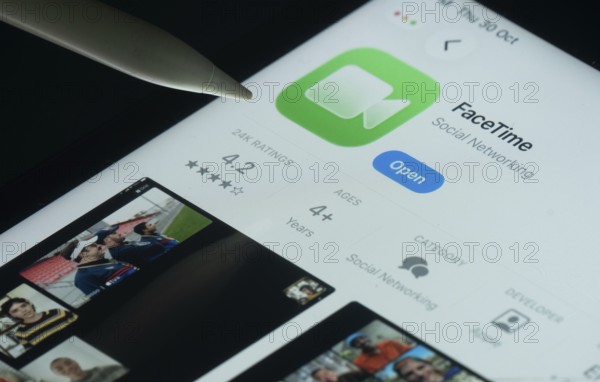 Dhaka, Bangladesh- 30 Oct 2025: Apple Facetime app on a iPad screen with a pen pointing at the install option