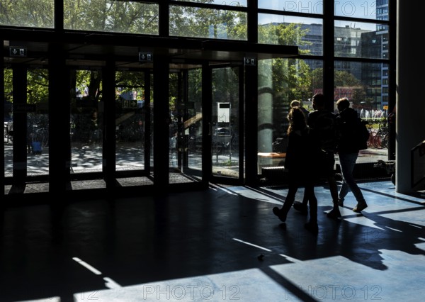 Foyer in a building of the Technical University of Berlin, light and shadow from people at the Marchstraße exit, Berlin, Germany
