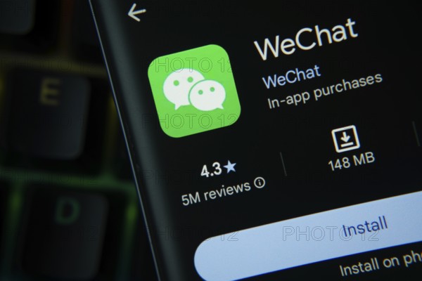 Dhaka, Bangladesh- 27 July 2025: wechat app from Google Playstore is displayed on a smartphone screen