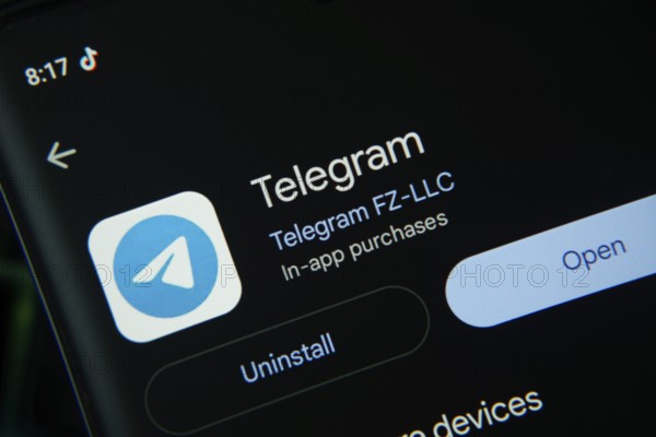Dhaka, Bangladesh- 27 July 2025: Screen displaying Telegram app with open and uninstall options, dark interface