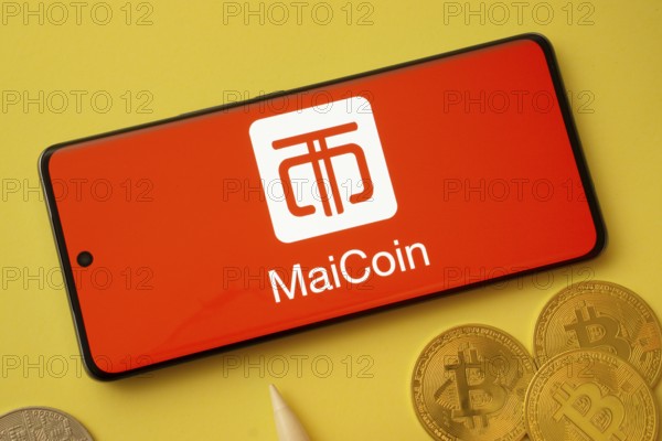 Dhaka, Bangladesh - 04 April 2025: The logo of MaiCoin is displayed on a smartphone screen