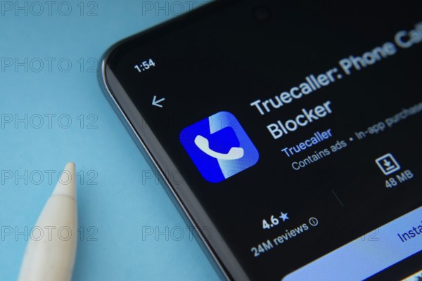 Dhaka, Bangladesh- 18 March 2025: The Truecaller app from Google Playstore is displayed on a smartphone screen