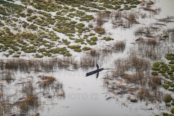 Marshland, marshland, Kavango fishermen with dugout boat, Mokoro, aerial view, Okavango Delta, Botswana