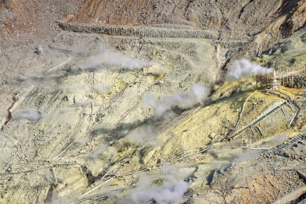 Steaming fumaroles in the Owakudani geothermal area at Komagatake volcano, Hakone, Japan