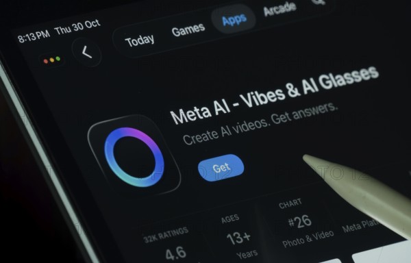 Dhaka, Bangladesh- 30 Oct 2025: Meta Ai app displayed on a iPad screen in dark mode with a digital pen pointing at it