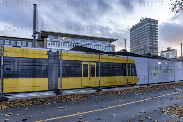 Construction site of the stop at the main train station, for the new city railway, visualization of the full-size tram, a new tram line over 5 km long, which will connect the west of Essen, the new district 51, with the city center, from 2026, Essen, North Rhine-Westphalia, Germany