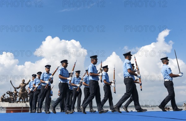 Indian Air Force personnel performs a bayonet drill demonstration on the bank of Brahmaputra river, during rehearsals ahead of the air show organised as part of the 93rd Air Force Day celebrations, on November 5, 2025 in Guwahati, India