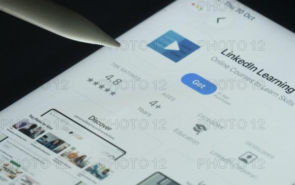 Dhaka, Bangladesh- 30 Oct 2025: Linkedin Learning app on a iPad screen with a pen pointing at the install option