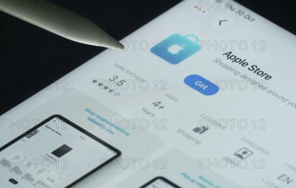 Dhaka, Bangladesh- 30 Oct 2025: Apple Store app on a iPad screen with a pen pointing at the install option