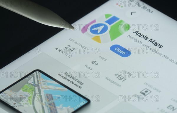 Dhaka, Bangladesh- 30 Oct 2025: Apple Maps app on a iPad screen with a pen pointing at the open option