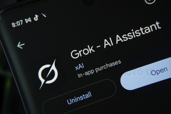 Dhaka, Bangladesh- 27 July 2025: Screen displaying Grok Ai app with open and uninstall options, dark interface