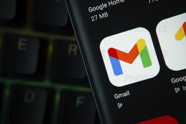 Dhaka, Bangladesh- 27 July 2025: Close-up of smartphone screen showing the Gmail app icon with a dark interface
