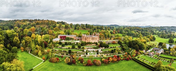 Autumn colours over Powis Castle and Garden from drone, Welshpool, Powys, Wales, England, United Kingdom
