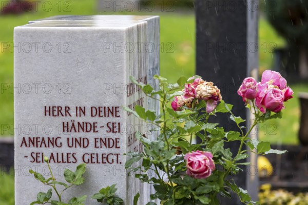 Pragfriedhof Stuttgart in autumn. November is traditionally a time for Christians to visit their graves. Symbolic photo with graves and grave decorations. Stuttgart, Baden-Württemberg, Germany