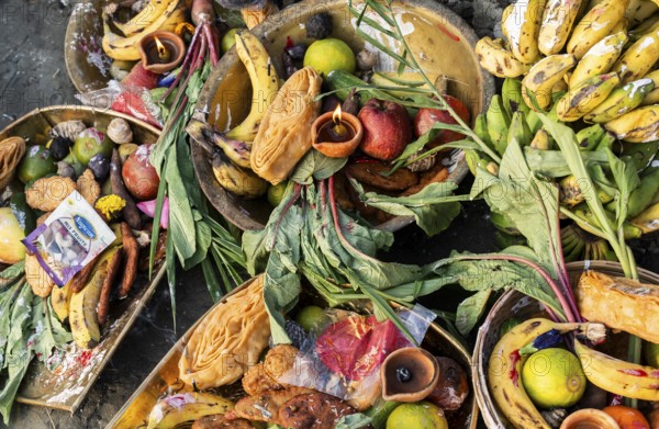 Hindu devotees gather on the banks of the Brahmaputra River to offer prayers to the Sun God on the occasion of Chhath Puja, in Guwahati, India on 27 October 2025