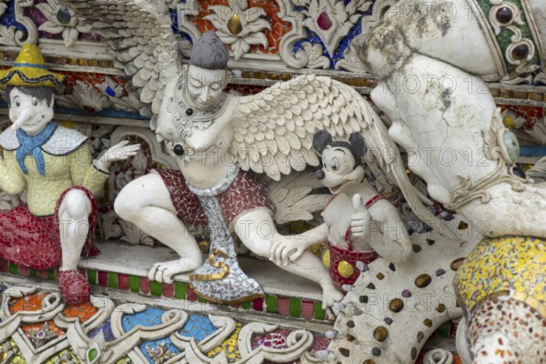 Decorative elements with pop culture references (for example comics, superheroes) in the stucco and porcelain vases outside and inside the art hall with modern art trends such as minimalism and abstraction, Wat Pariwat, Yan Nawa district, Bangkok, Thailand