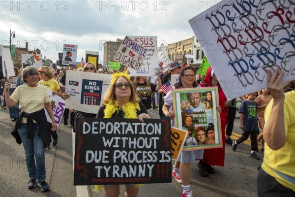 Detroit, Michigan USA - 18 October 2025 - A large crowd gathered for a 'No Kings' rally, protesting President Trump's actions against immigrants and against democratic institutions