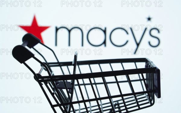 Dhaka, Bangladesh- 03 July 2025: Silhouette of a shopping cart in front of the Macy's logo, symbolizing ecommerce and online shopping