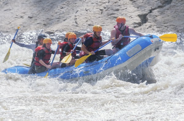 A group of people white water rafting, Costa Rica, Central America
