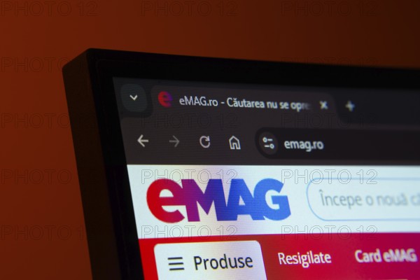 Dhaka, Bangladesh- 03 Oct 2025: Close-up of a computer screen displaying the Emag web interface in dark mode