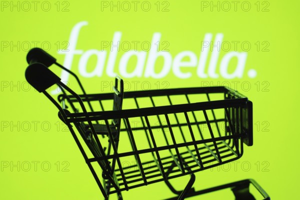 Dhaka, Bangladesh- 03 Oct 2025: Silhouette of a shopping cart in front of the Falabella. logo, symbolizing ecommerce and online shopping