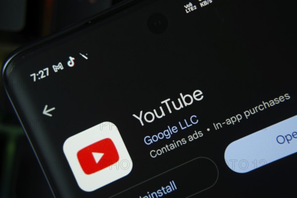 Dhaka, Bangladesh- 27 July 2025: Screen displaying YouTube Kids app with open and uninstall options, dark interface