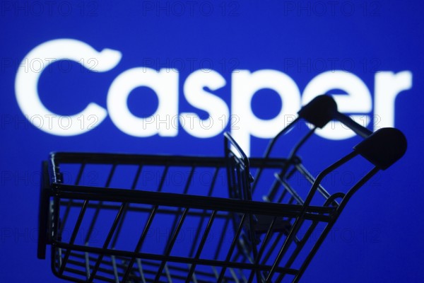 Dhaka, Bangladesh- 03 July 2025: Silhouette of a shopping cart in front of the Casper logo, symbolizing ecommerce and online shopping