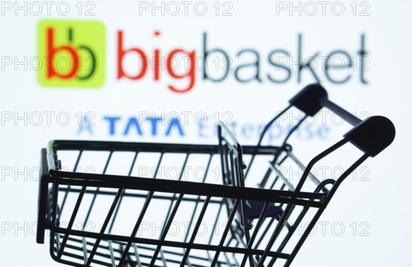 Dhaka, Bangladesh- 03 July 2025: Silhouette of a shopping cart in front of the BigBasket logo, symbolizing ecommerce and online shopping