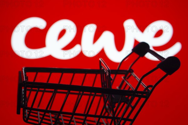 Dhaka, Bangladesh- 03 July 2025: Silhouette of a shopping cart in front of the Cewe logo, symbolizing ecommerce and online shopping