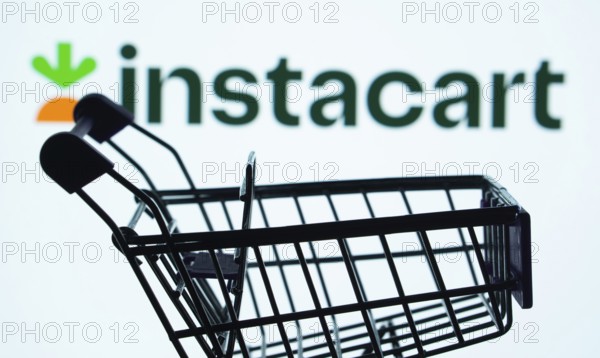 Dhaka, Bangladesh- 03 July 2025: Silhouette of a shopping cart in front of the Instacart logo, symbolizing ecommerce and online shopping