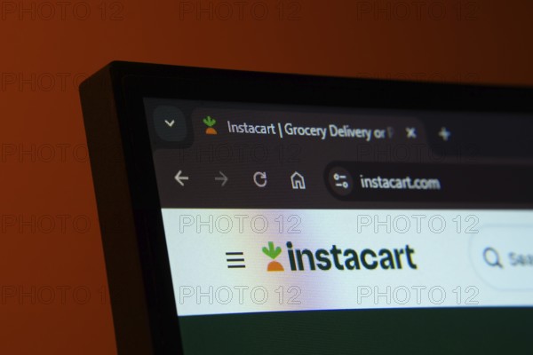 Dhaka, Bangladesh- 02 June 2025: Close-up of a computer screen displaying the Instacart web interface in dark mode