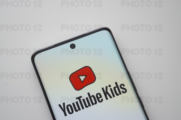 Dhaka, Bangladesh - 06 Sep 2025: The logo of Youtube kids is displayed on a smartphone screen