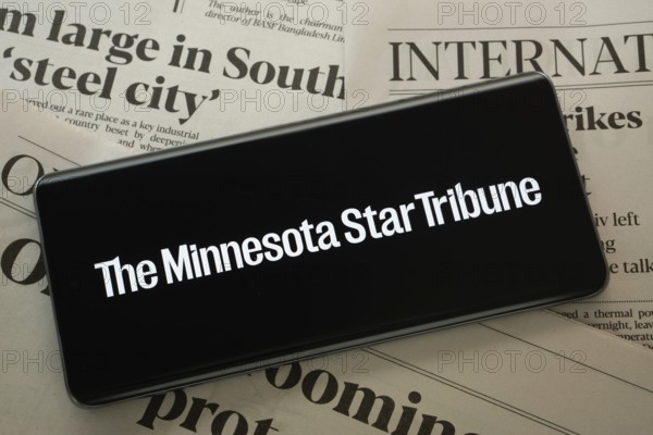 Dhaka, Bangladesh - 18 March 2025: The logo of The Minnesota star tribune is displayed on a smartphone screen