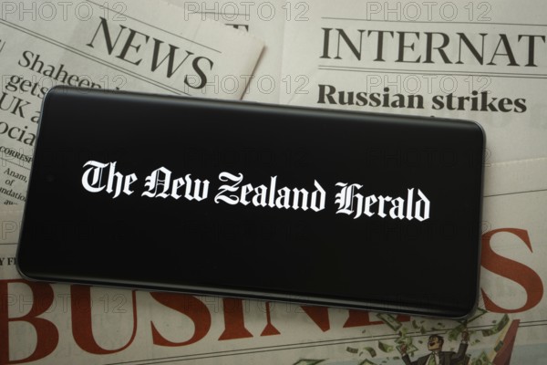 Dhaka, Bangladesh - 18 March 2025: The logo of the new zealand herald is displayed on a smartphone screen