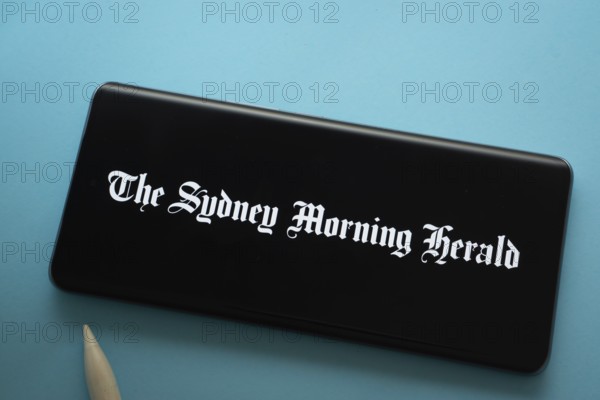 Dhaka, Bangladesh - 18 March 2025: The logo of the sydney morning herald is displayed on a smartphone screen