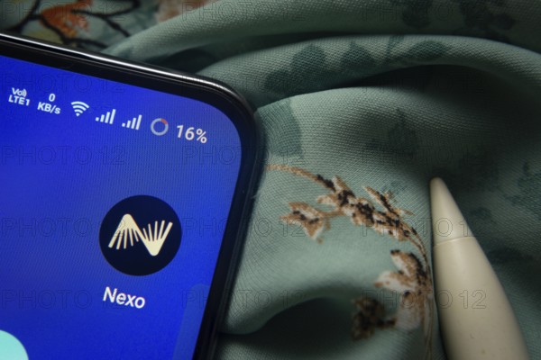 Dhaka, Bangladesh- 07 May 2025: Nexo app icon is seen on smartphone