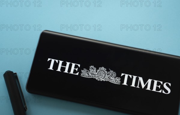 Dhaka, Bangladesh - 18 March 2025: The logo of the times is displayed on a smartphone screen