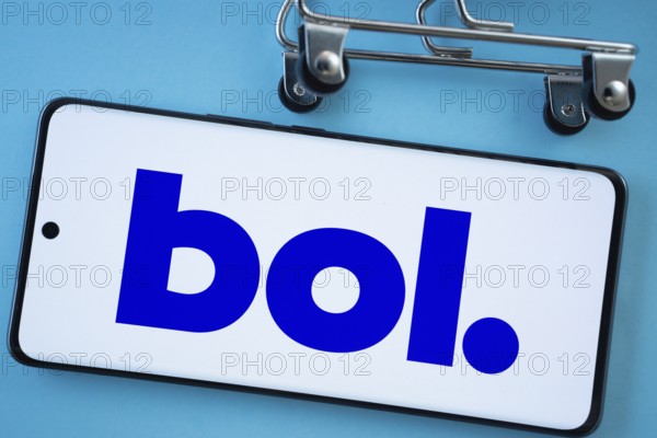 Dhaka, Bangladesh- 03 July 2025: Smartphone screen showing the bol logo with shopping cart wheels on a blue background