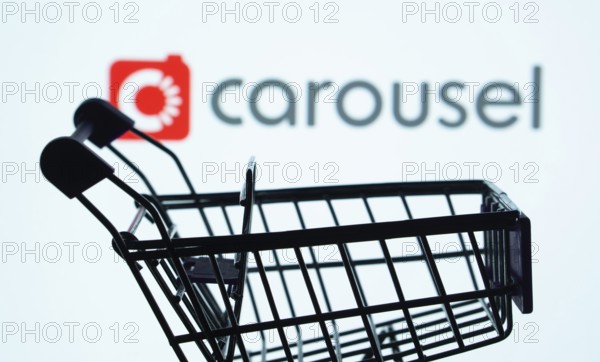 Dhaka, Bangladesh- 03 July 2025: Silhouette of a shopping cart in front of the Carousell logo, symbolizing ecommerce and online shopping