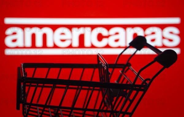 Dhaka, Bangladesh- 03 July 2025: Silhouette of a shopping cart in front of the Americanas logo, symbolizing ecommerce and online shopping