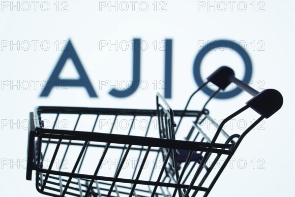 Dhaka, Bangladesh- 03 July 2025: Silhouette of a shopping cart in front of the AJIO logo, symbolizing ecommerce and online shopping