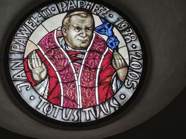 Religious motif, Pope John Paul 2 in a stained glass window in a small Polish village on the Vistula, with a detailed depiction, Poland