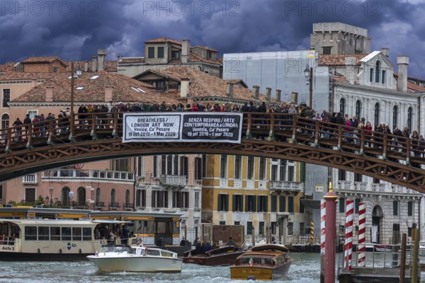 Crowds of tourists on the Ponte dell'Accademia in high season, Venice, Veneto, Italy
