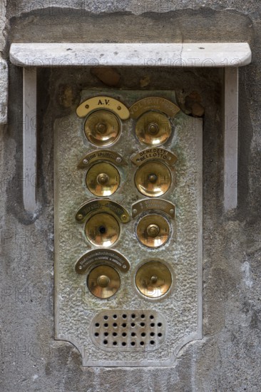 Brass bells on a residential building, Venice, Veneto, Italy