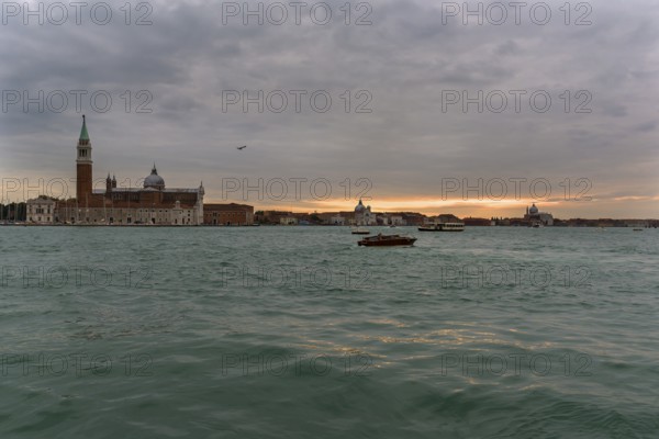 View of the island of San Giorgio Maggiore from Venice at dusk, Venice Lagoon in front, Venice, Veneto, Italy
